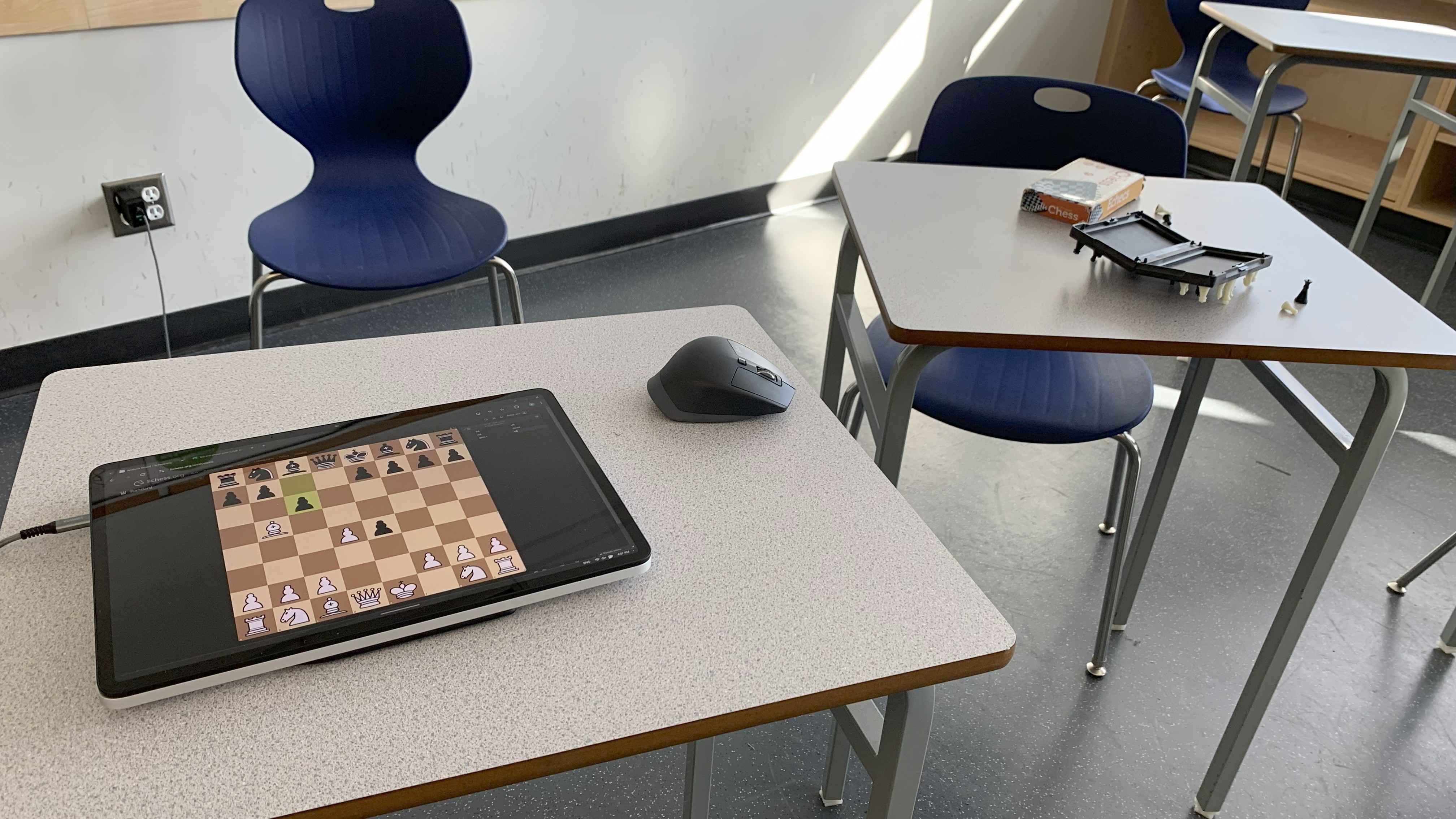 Image of 2 chess boards in the room.